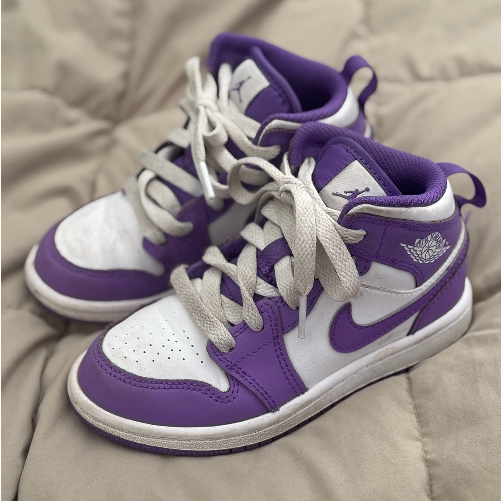 Toddler size 11c purple and white Nike Jordans